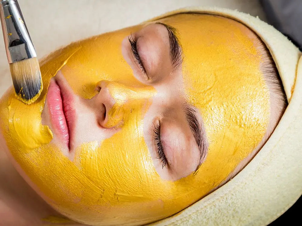 Woman with glowing, healthy skin following Ayurvedic skincare routine